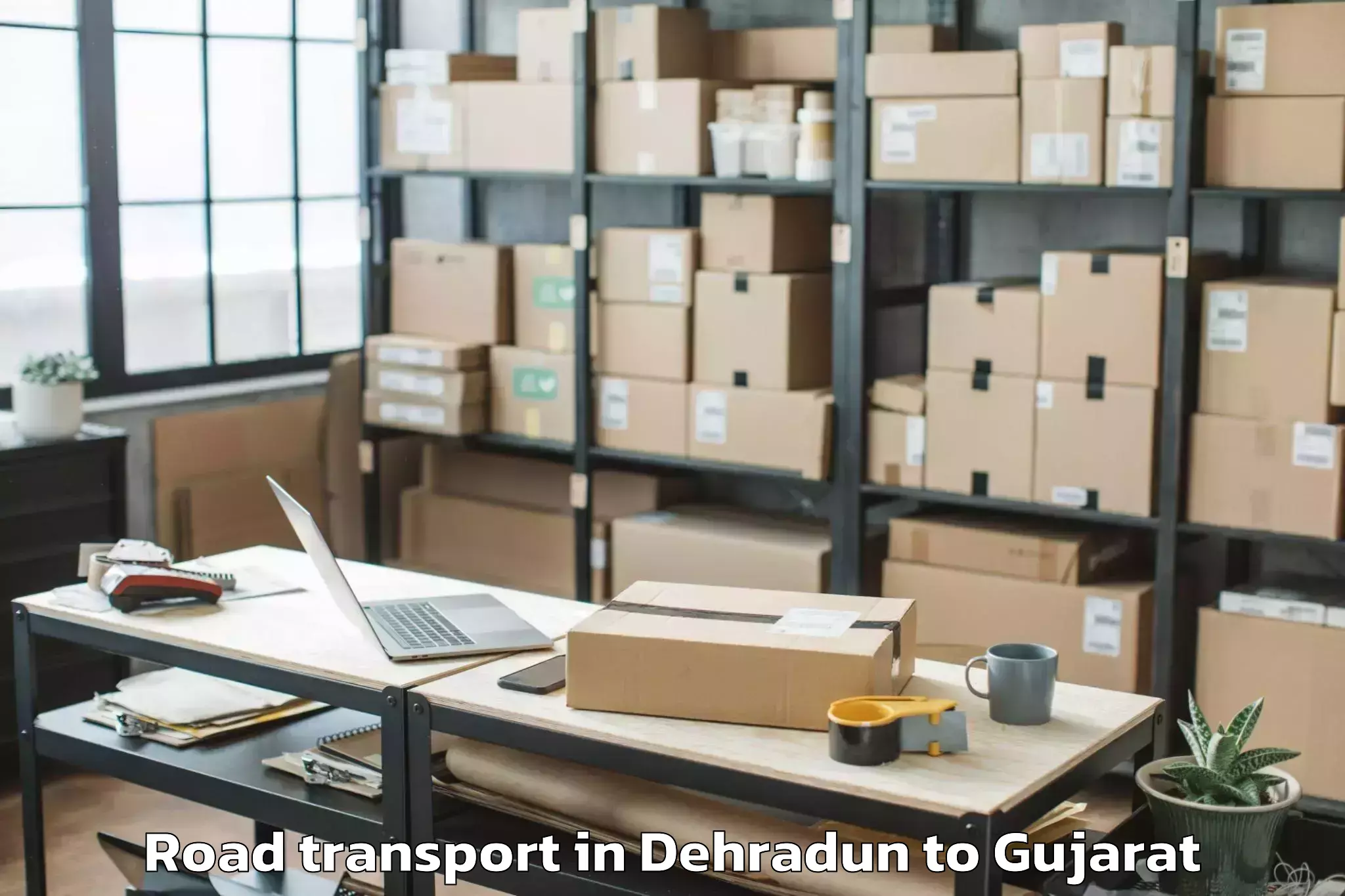 Expert Dehradun to Gussar Road Transport